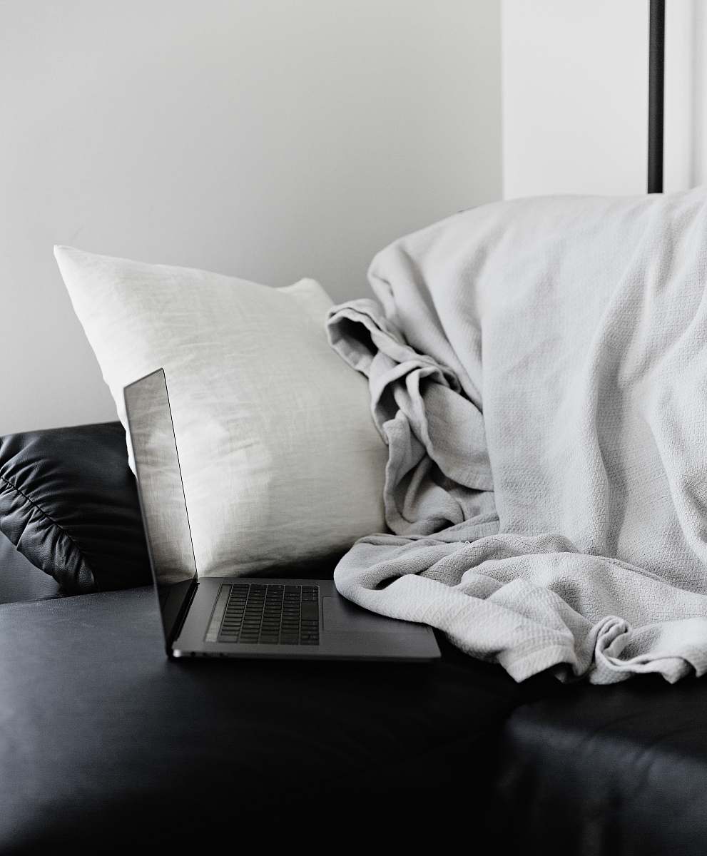 black-and-white silver MacBook home