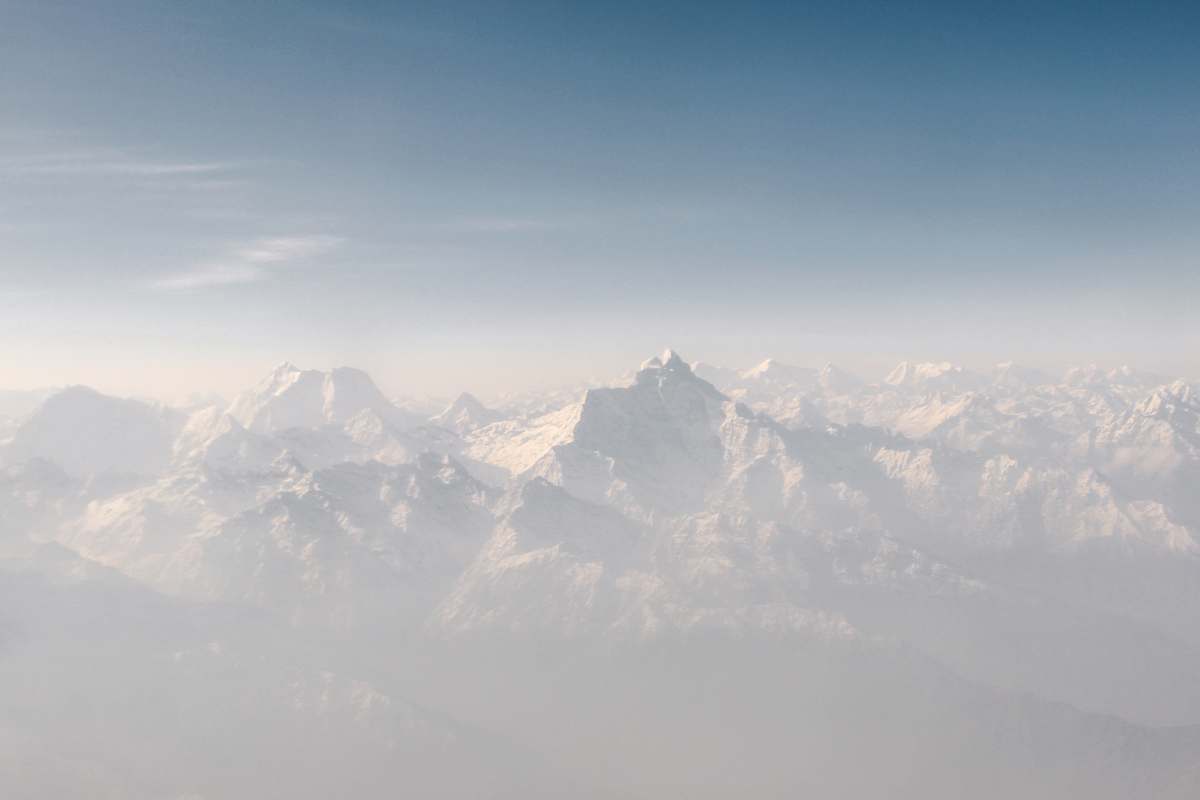 mountain snow cap mountains under blue sky at daytime mountain range