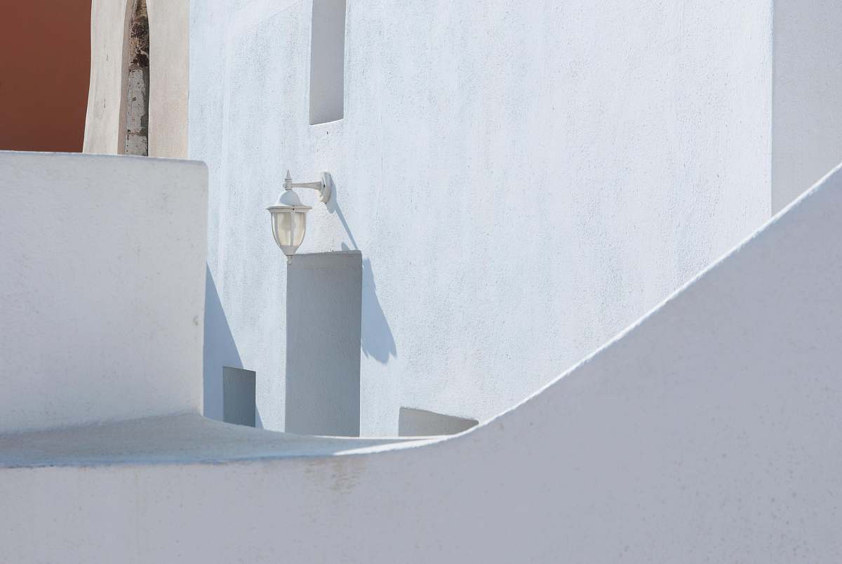 greece turned off wall sconce oia