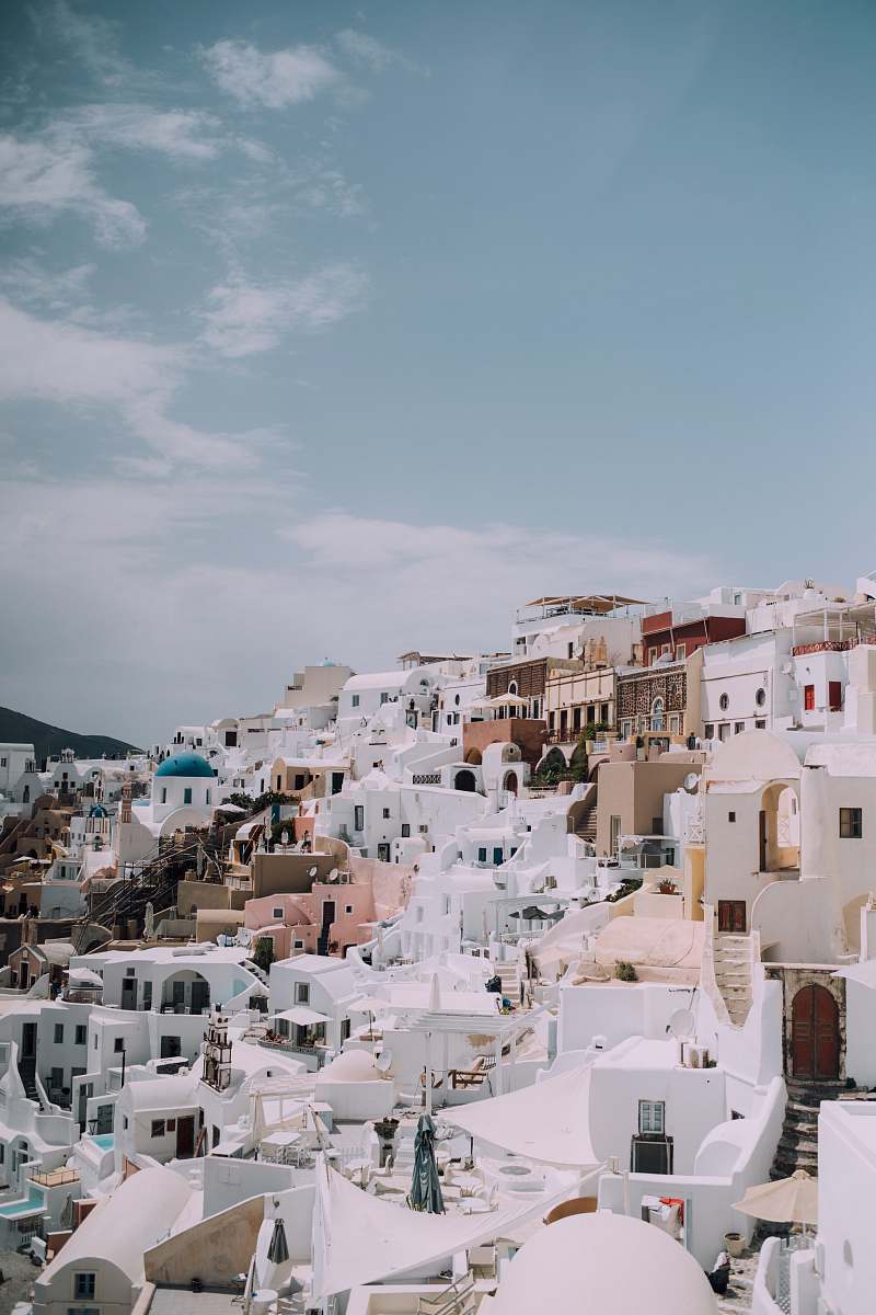 greece white and brown building oia