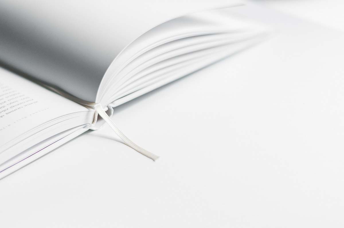 white white book marker on book page black-and-white