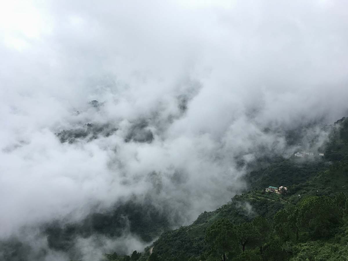 mountain white clouds over a mountain fog
