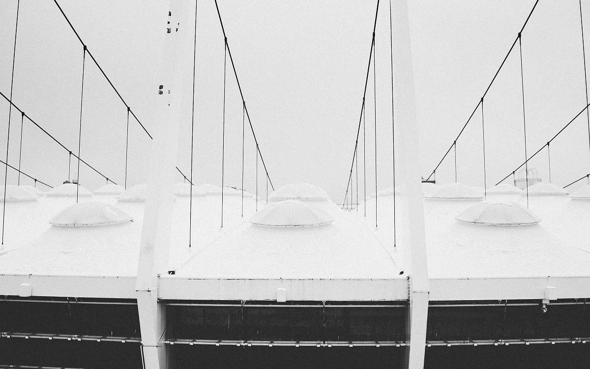 black-and-white white top covered with snows watercraft
