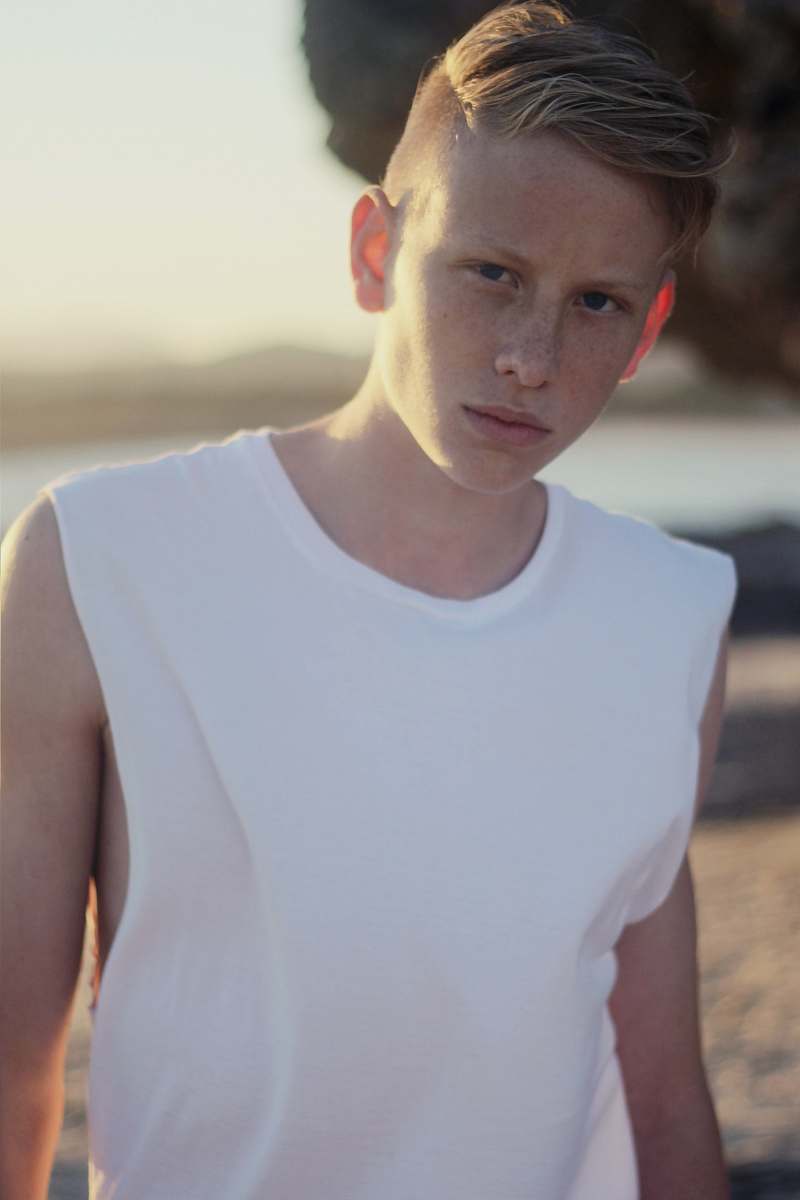 person boy on beach apparel