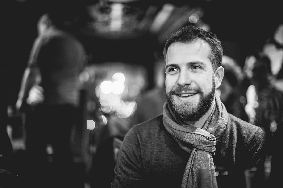 black-and-white grayscale photography of man with scarf people