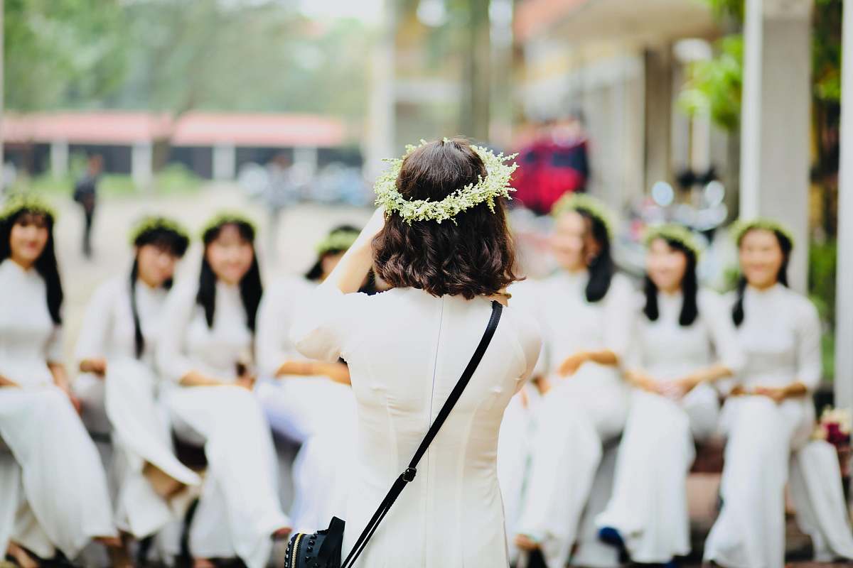 people group of woman wearing white dresses person