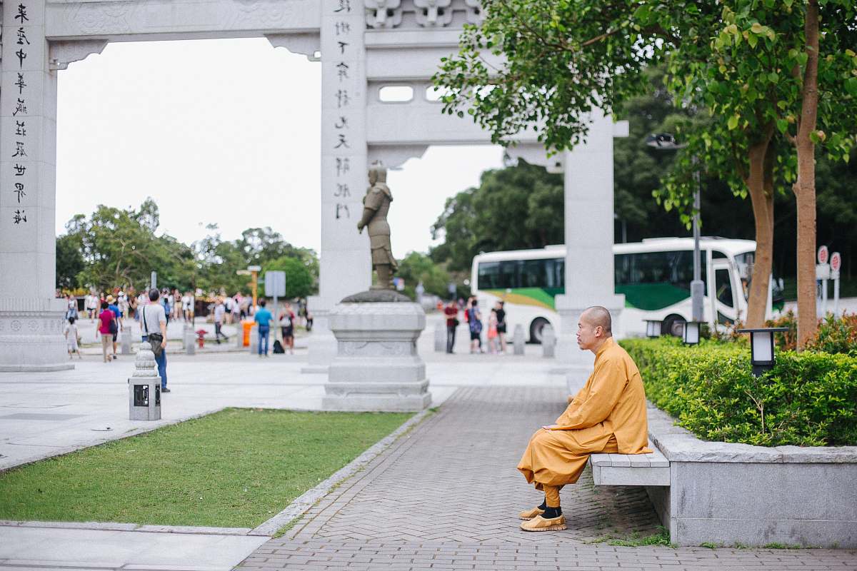 person man sitting on bench bus