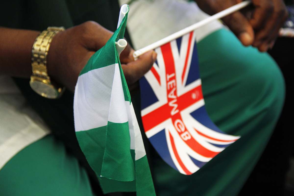person person holding mini flag people