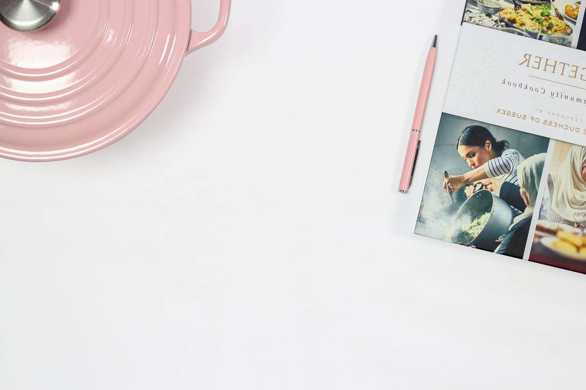 people pink pen on white surface person