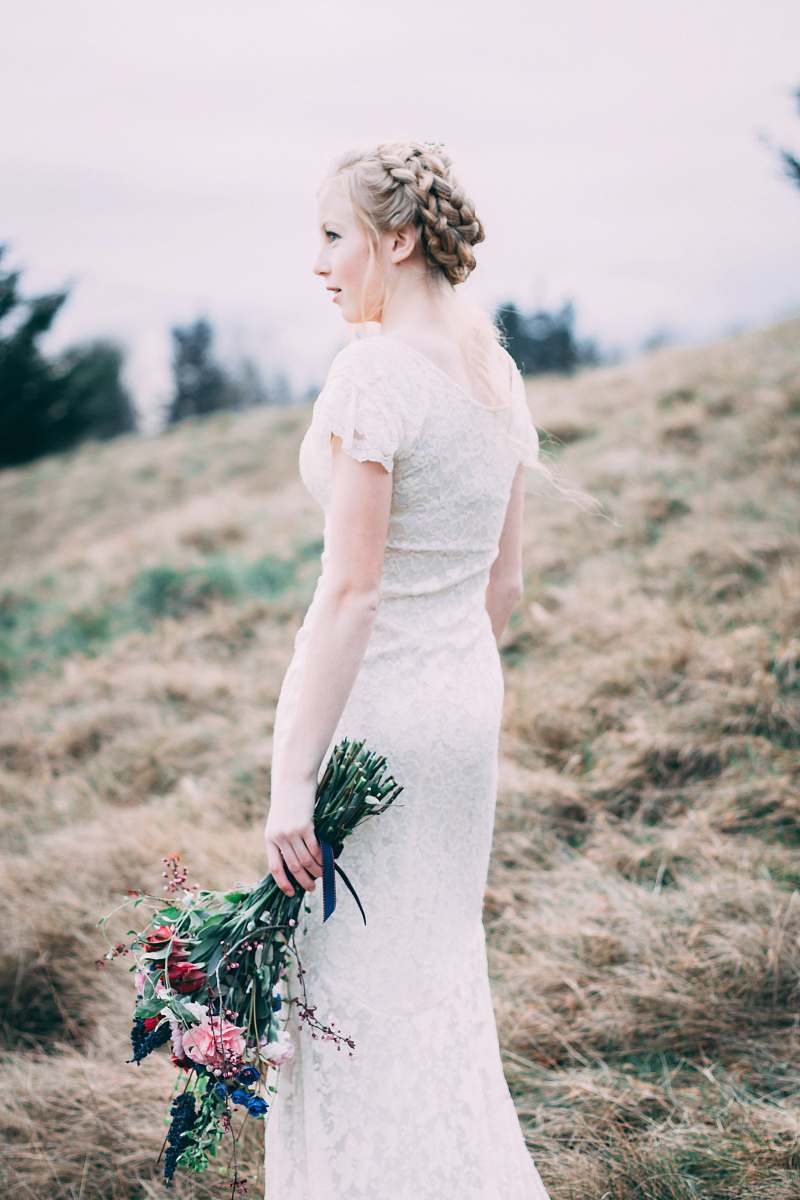 person woman holding flower bouquet people