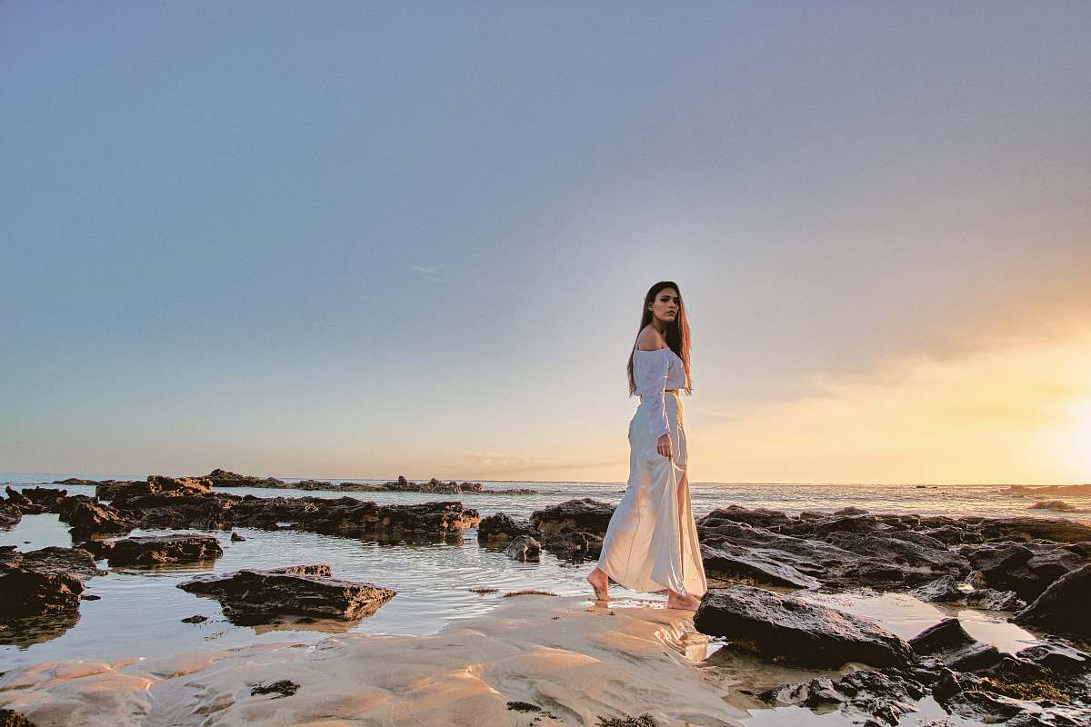 person woman standing on body of water people