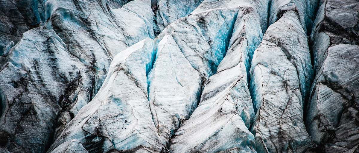 glacier frozen rock cliff at daytime iceland