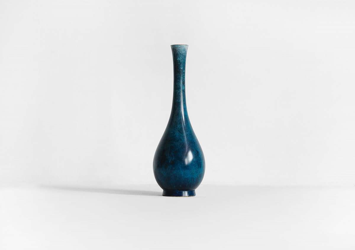 vase photography of blue ceramic vase against white background pottery