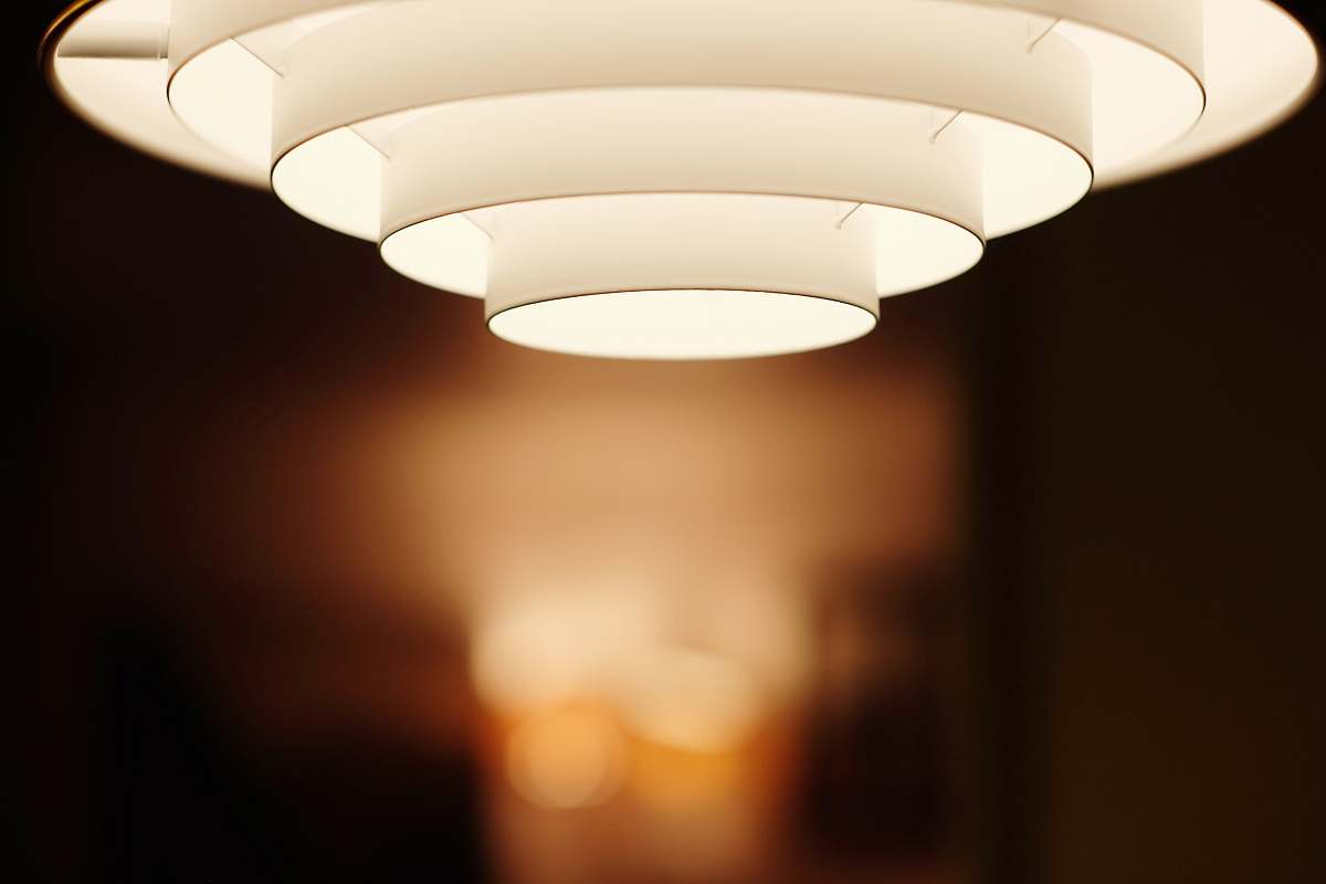 minimal selective focus photo of white ceiling light lamp