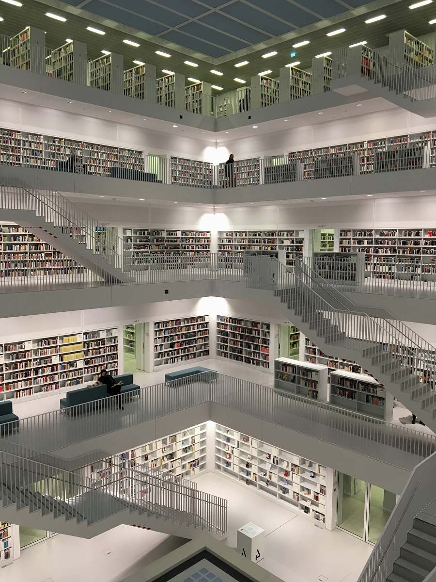 stuttgart person sitting on couch inside building staircase