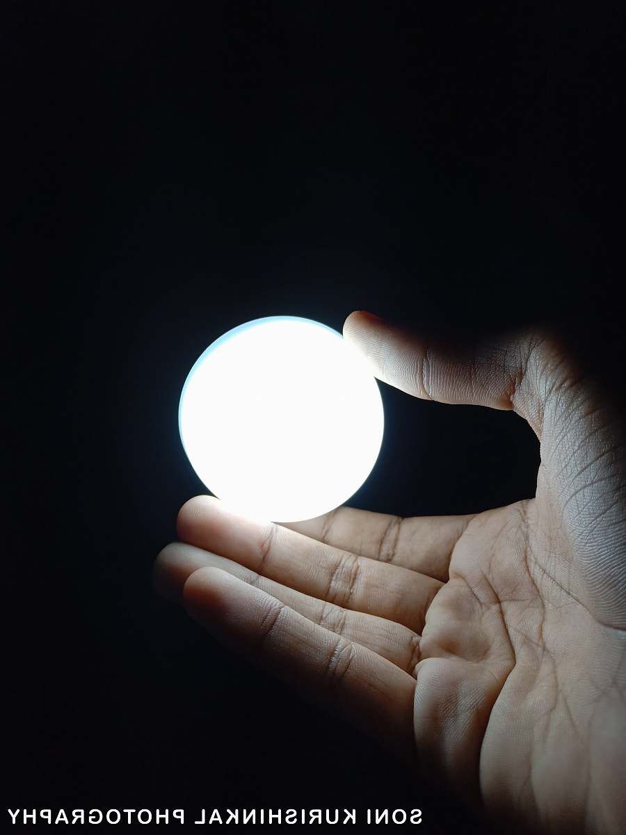 human person holding ball of light person