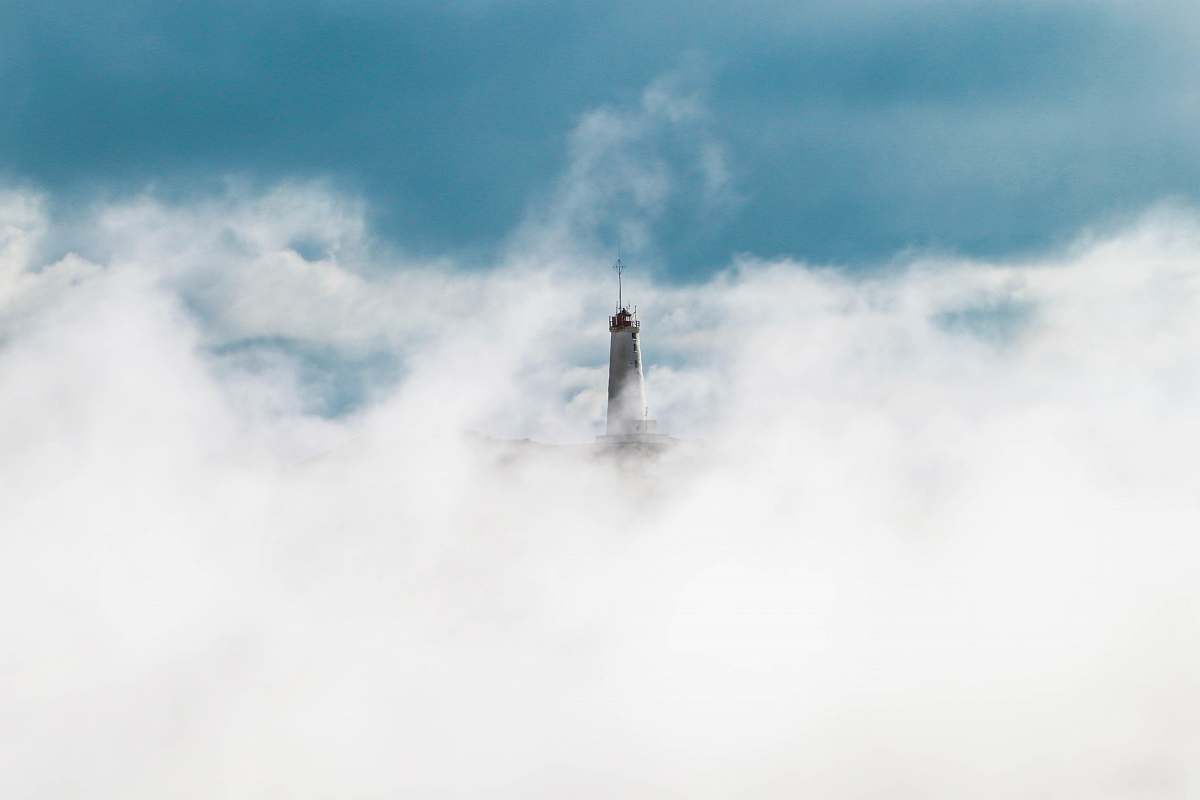 cloud gray statue covered in white clouds sky