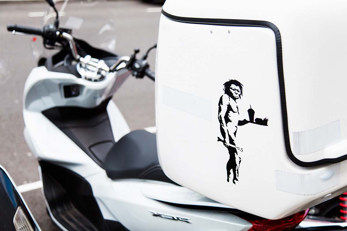 stencil white and black motor scooter with top box motor scooter