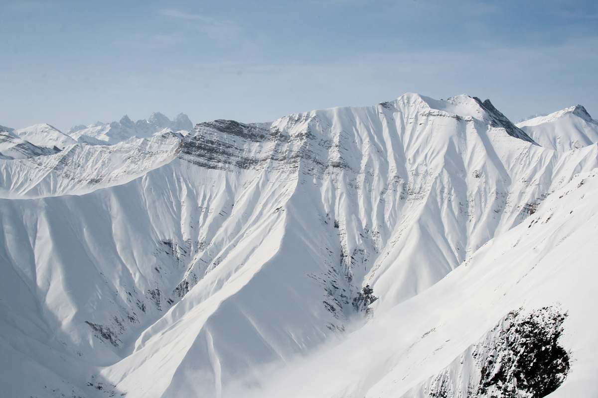 snow birds eye photography of snow covered mountain ice