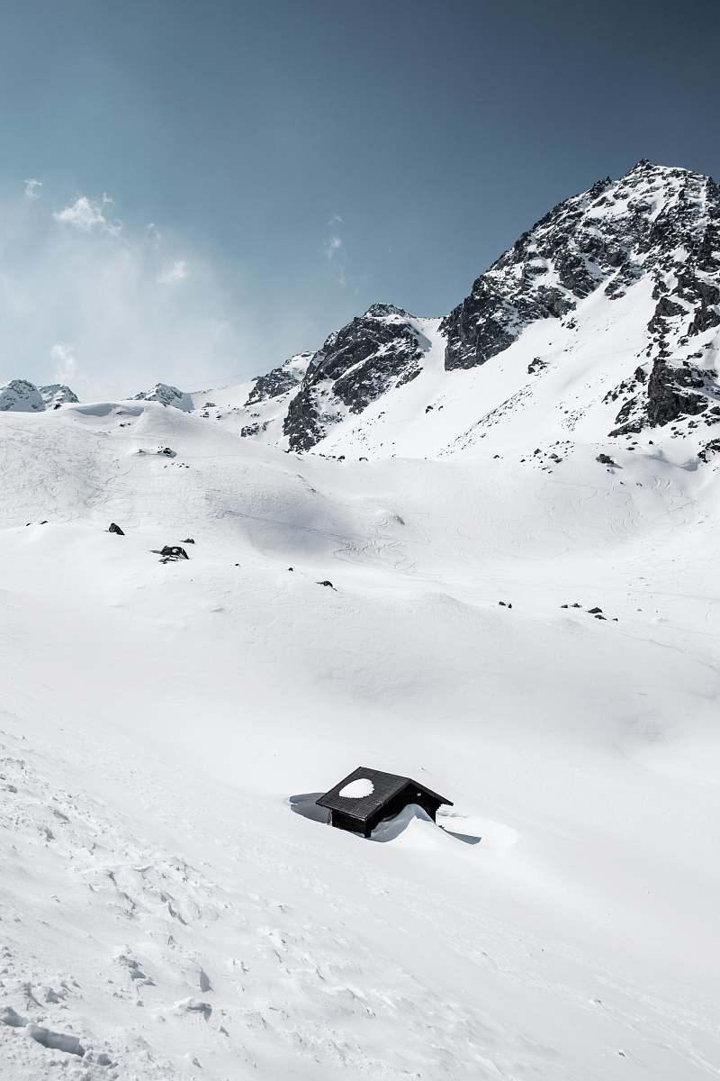 alps black house in middle of glacier mountain during daytime verbier