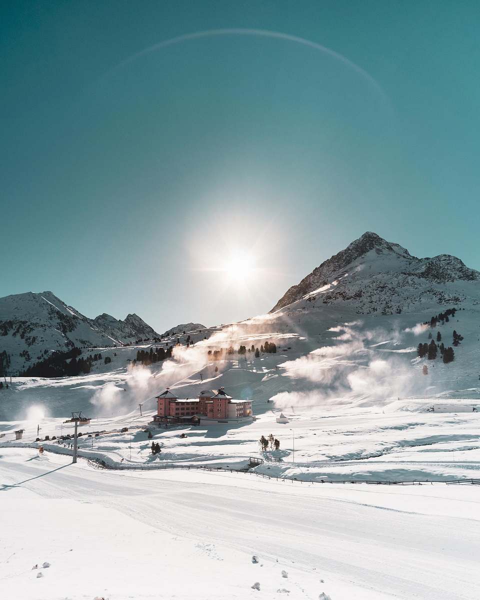outdoors brown building on snow field during daytime nature