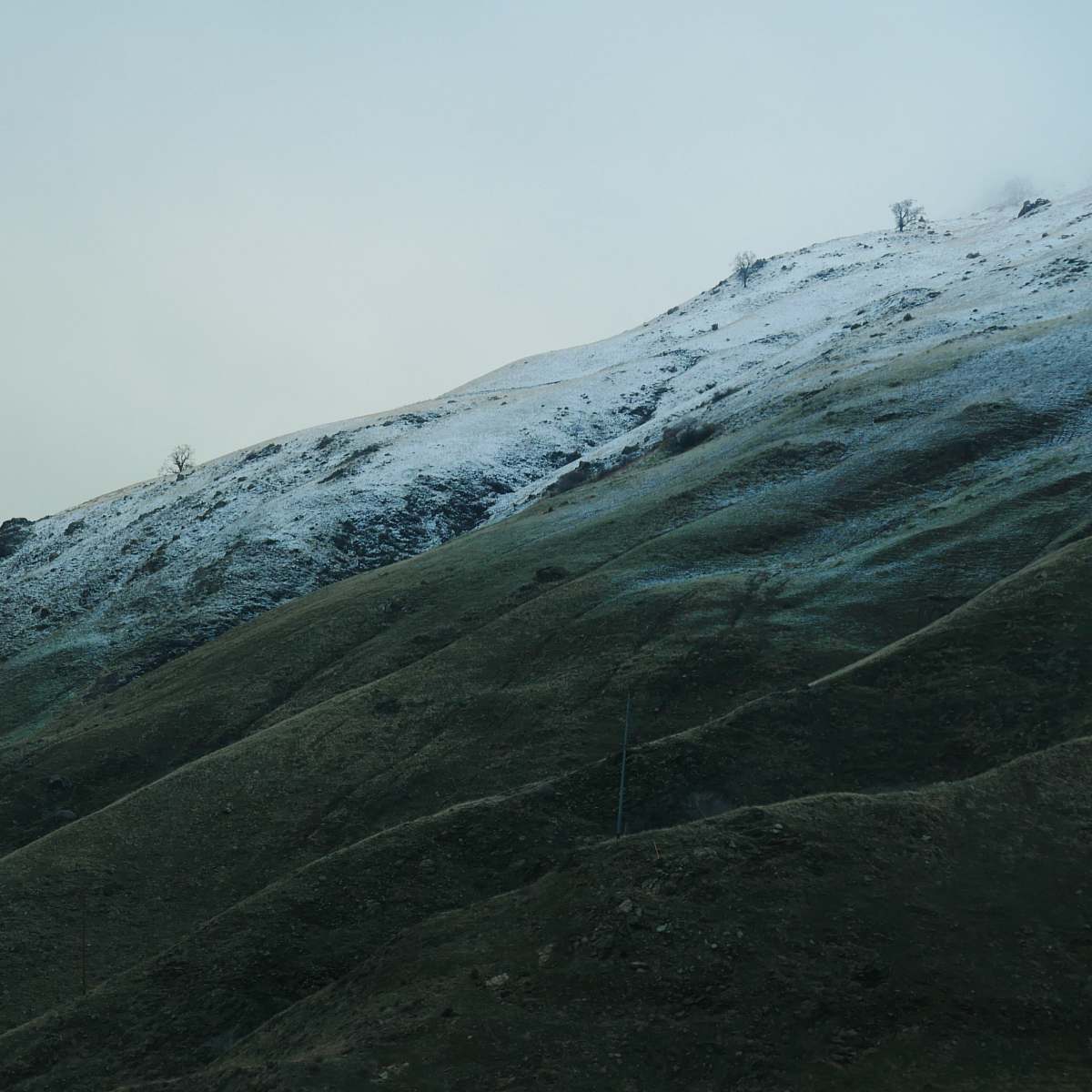 nature gray and white mountain with snow field snow