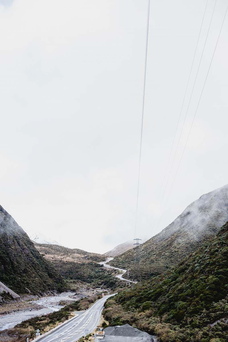 nature highway covered with fog outdoors