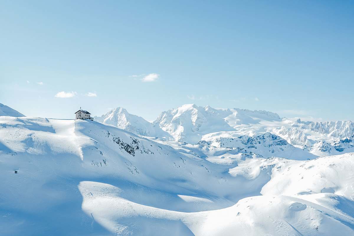 snow house on top of snow covered hills and mountains during day nature