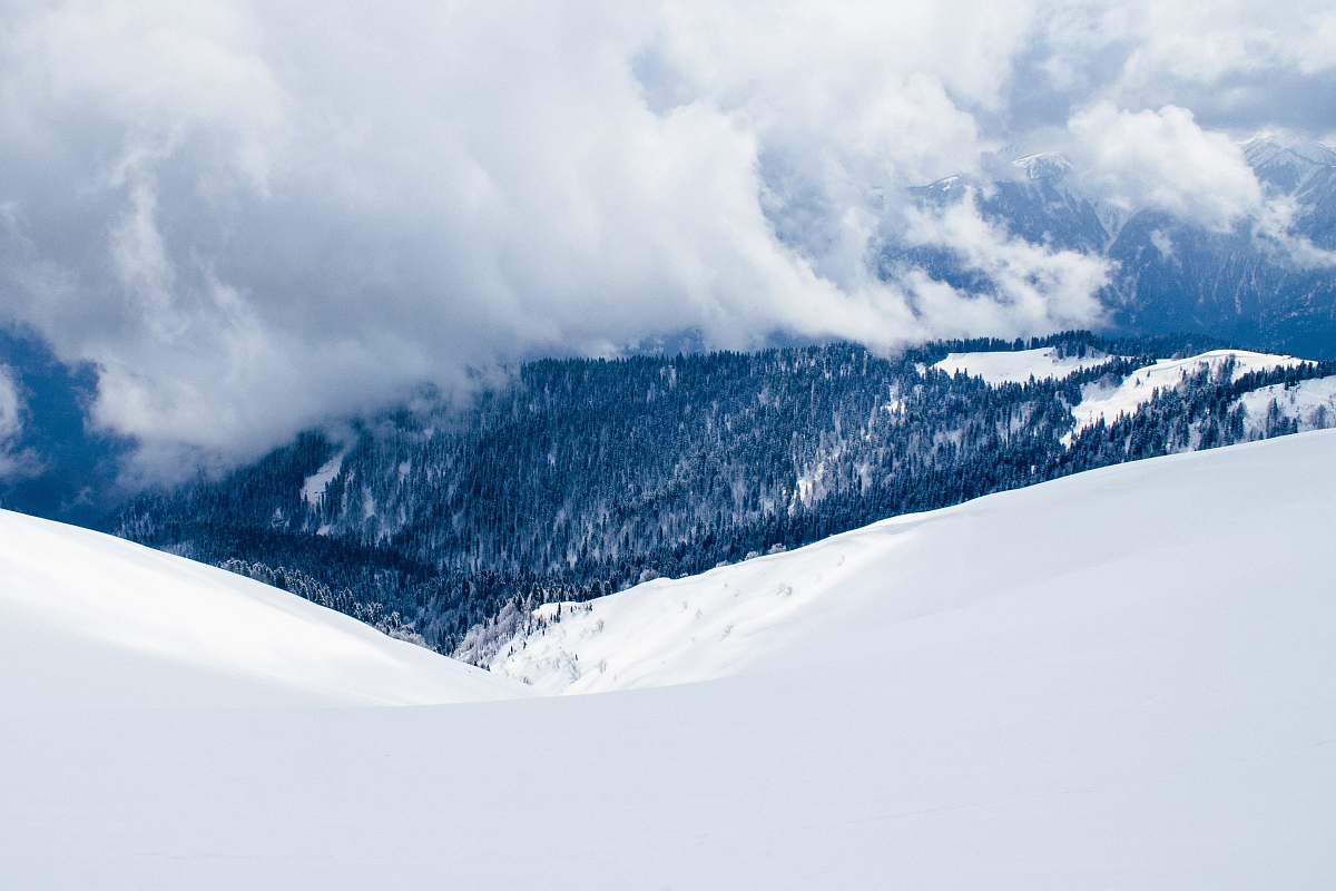 nature landscape photography of snow covered hill clouds