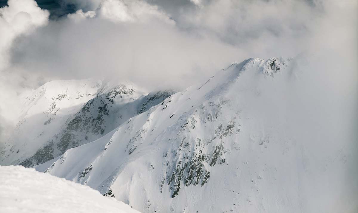snow mountain covered with snow grey