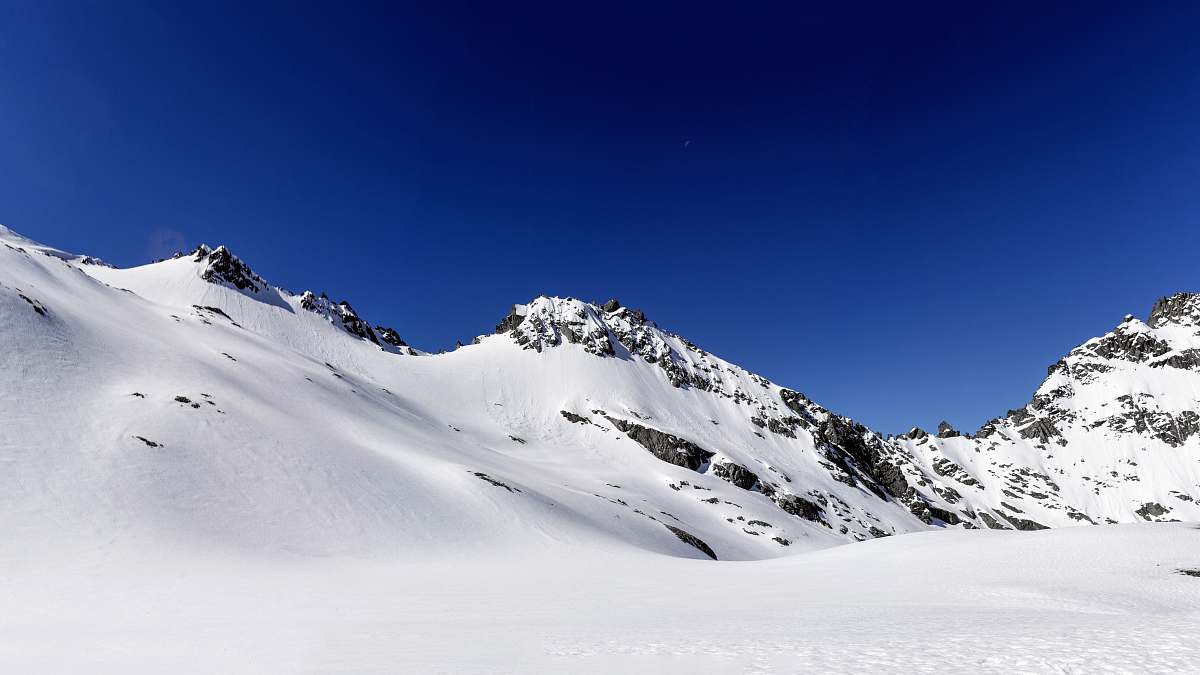 nature mountain covered with snow under blue sky new zealand