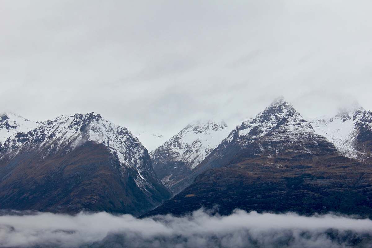 nature snow-capped mountain in mist snow