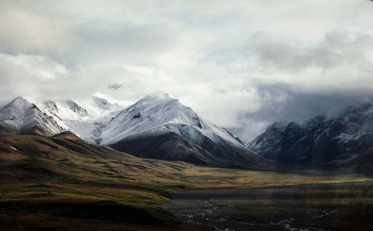 nature snow-capped mountain under sky mountain range