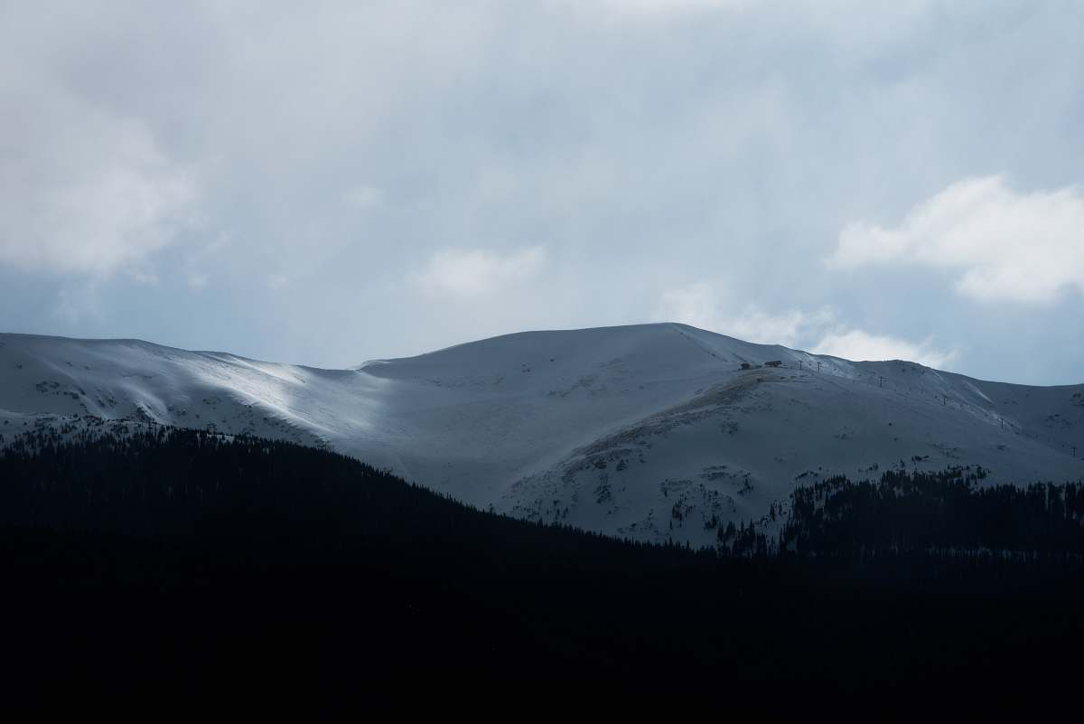 grey snow covered mountain mountain range