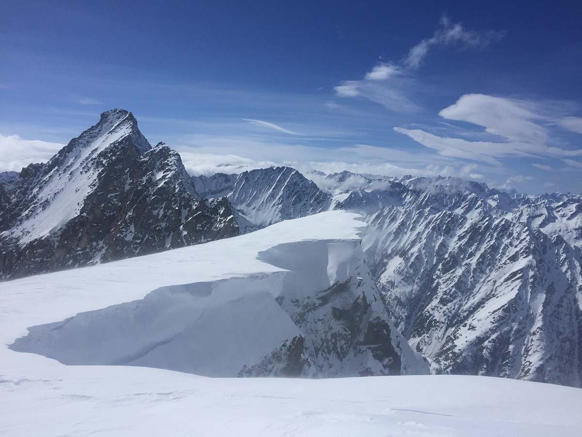 nature snowcap mountains during daytime snow