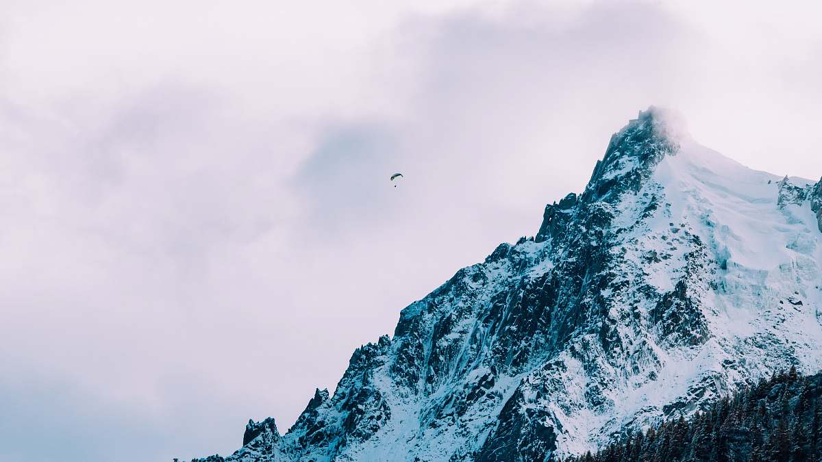 snow snowy mountain during daytime ice