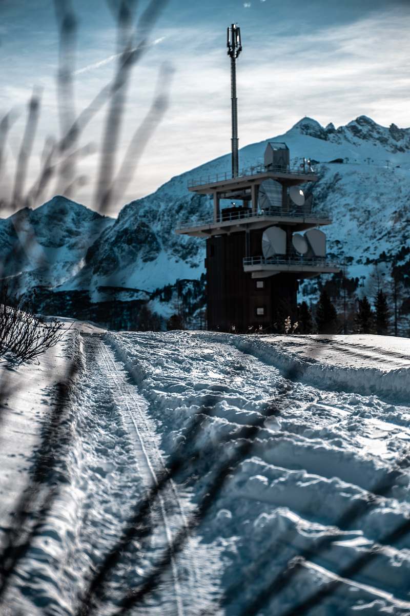nature white and black house on snowfield during daytime outdoors