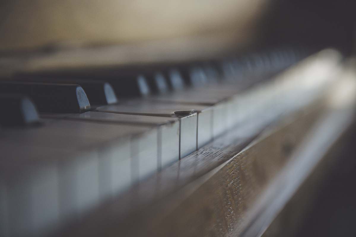 piano brown wooden framed piano keys