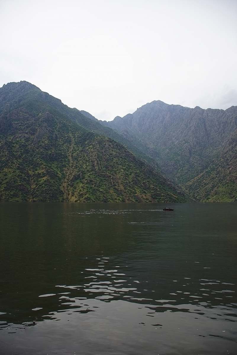 outdoors calm water near mountains water