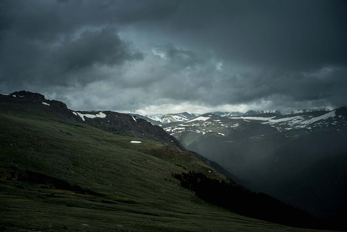 outdoors green mountain under cloudy sky mountain
