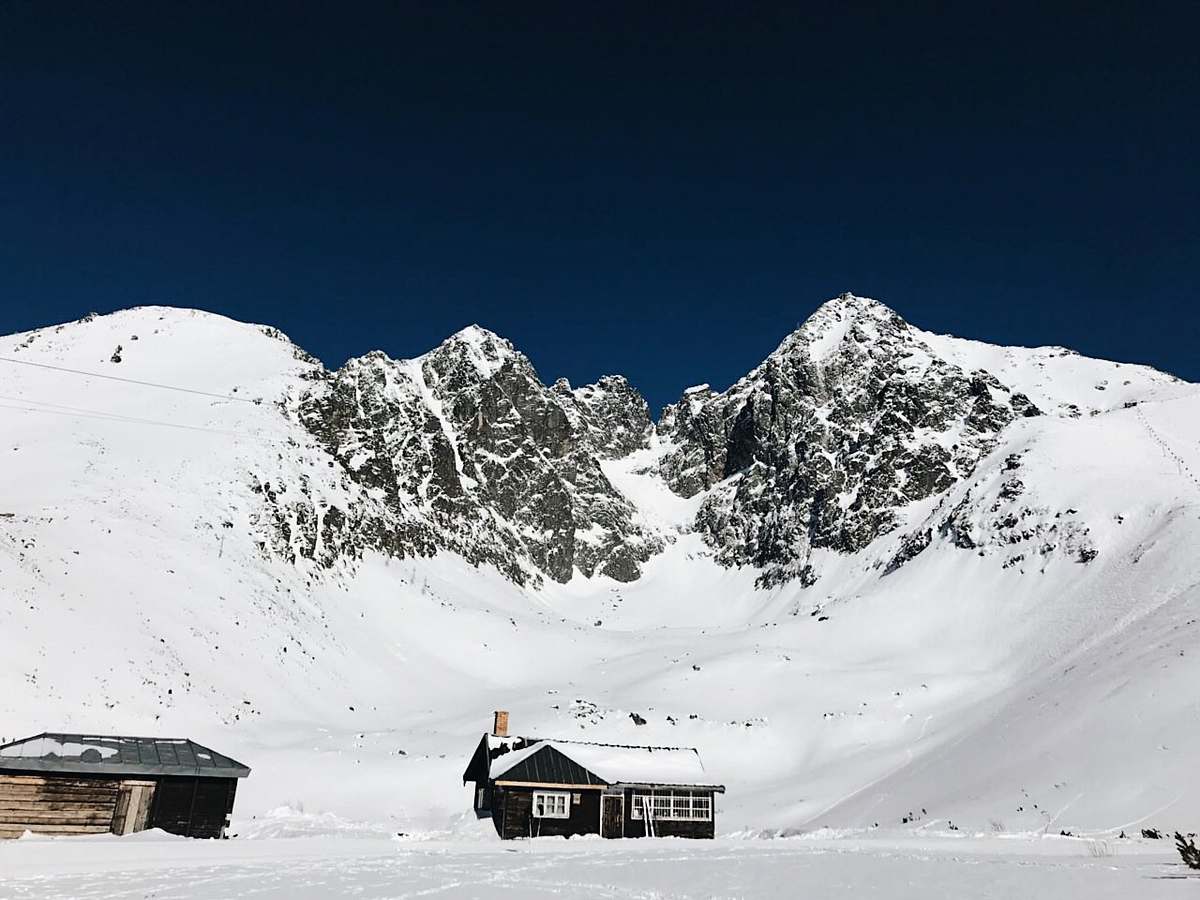 outdoors houses and snow-covered mountain building