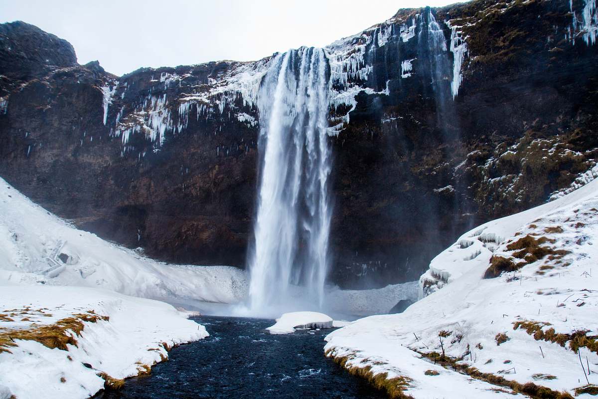 snow low-angle photography of waterfalls during winter ice