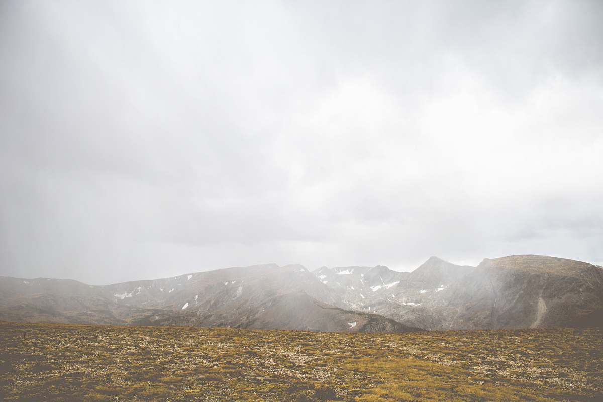 outdoors mountains and brown grass field plateau