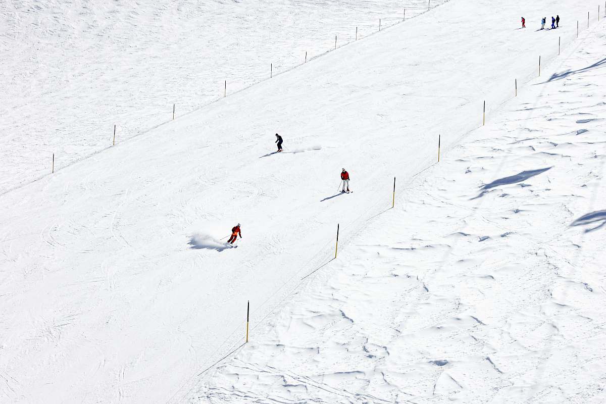 slope people skiing on snow outdoors