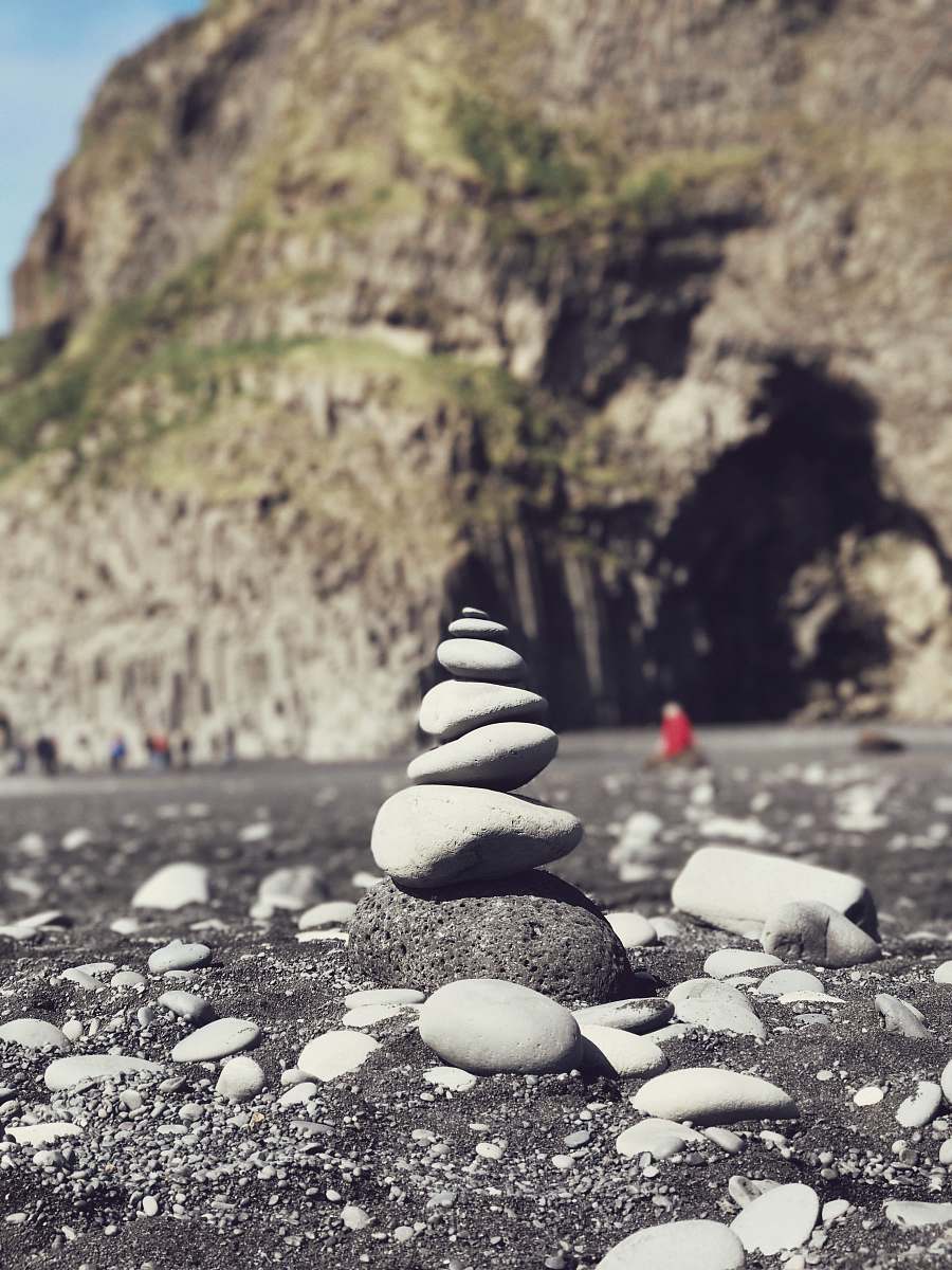 landslide stack of stone at shore near rockways rock