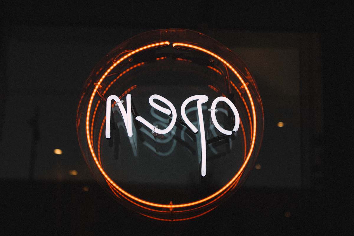 sign white and orange open LED signage turned on glow