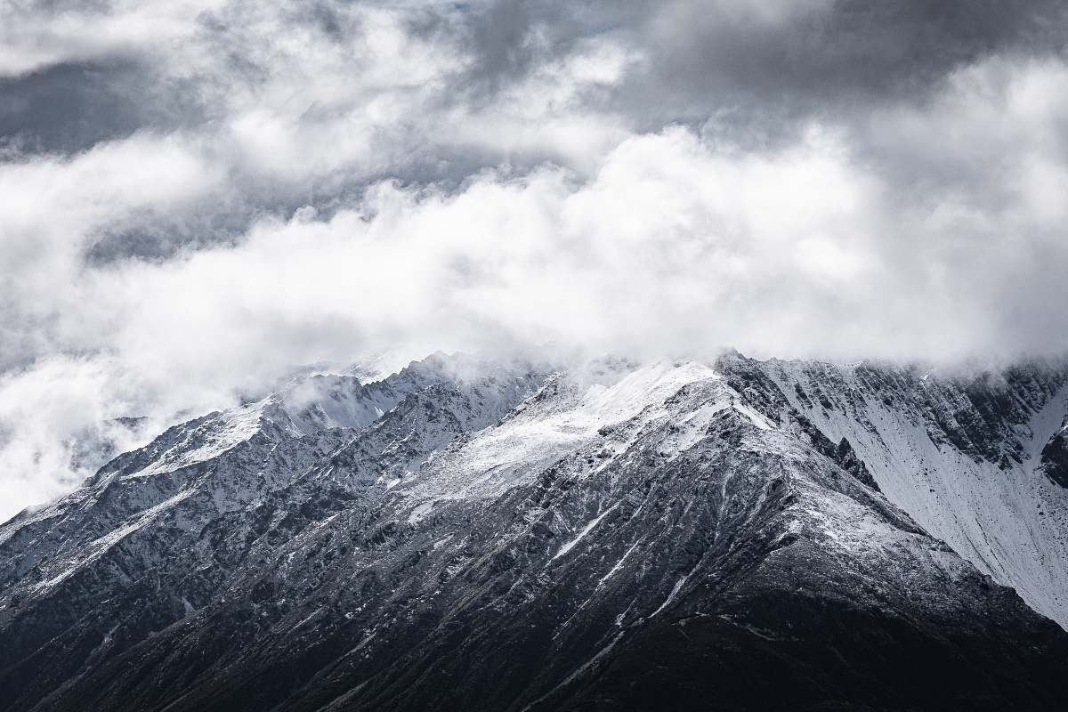 mountain aerial photography of gray and black mountain mountain range