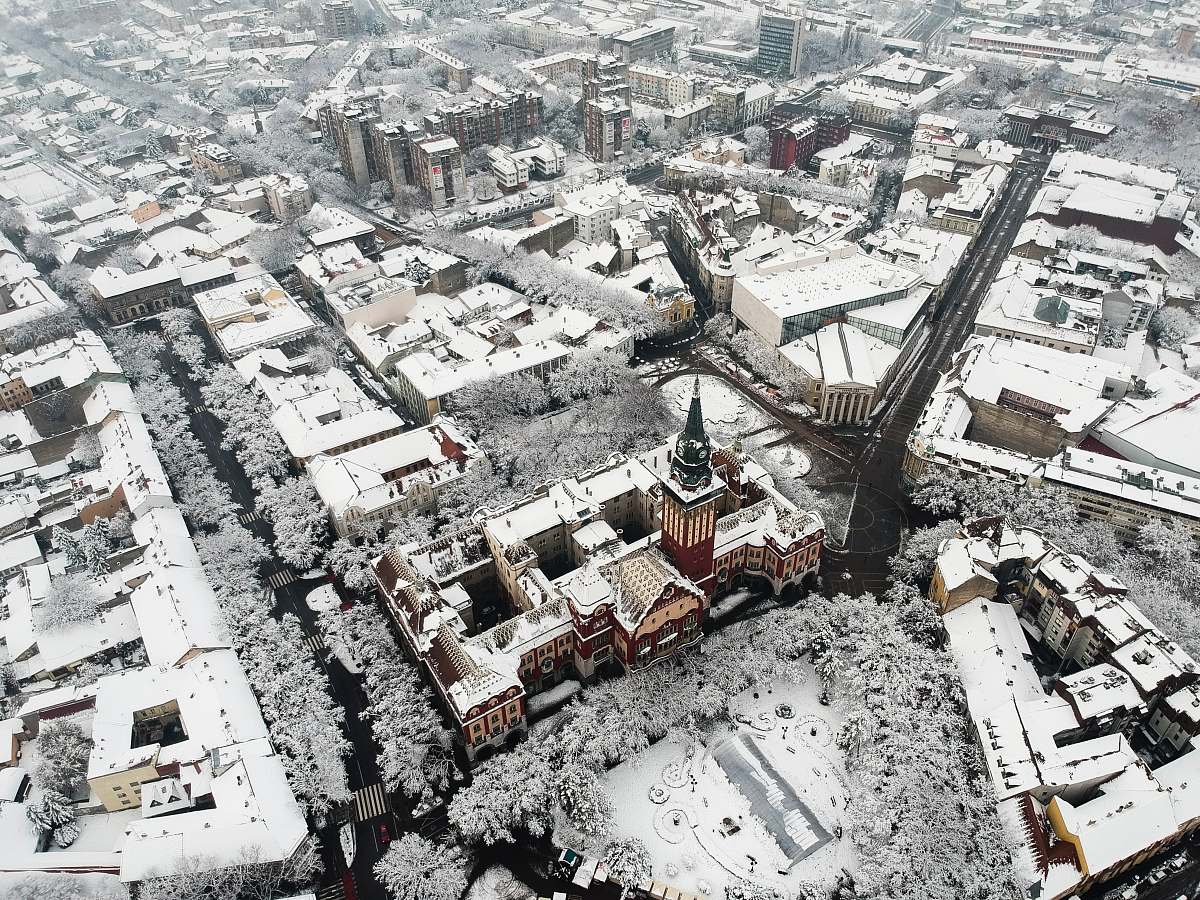landscape aerial photography of snow covered city buildings nature