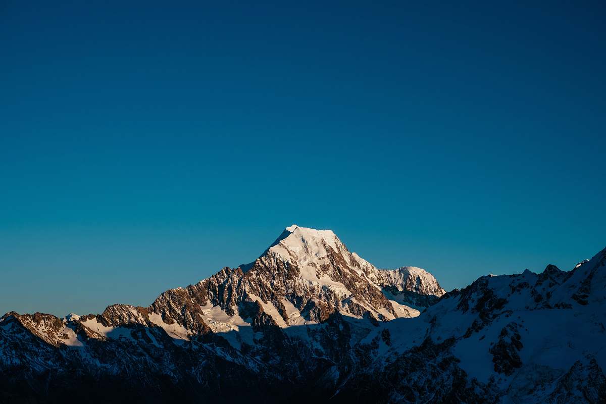 mountain mountains with snow under blue sky nature