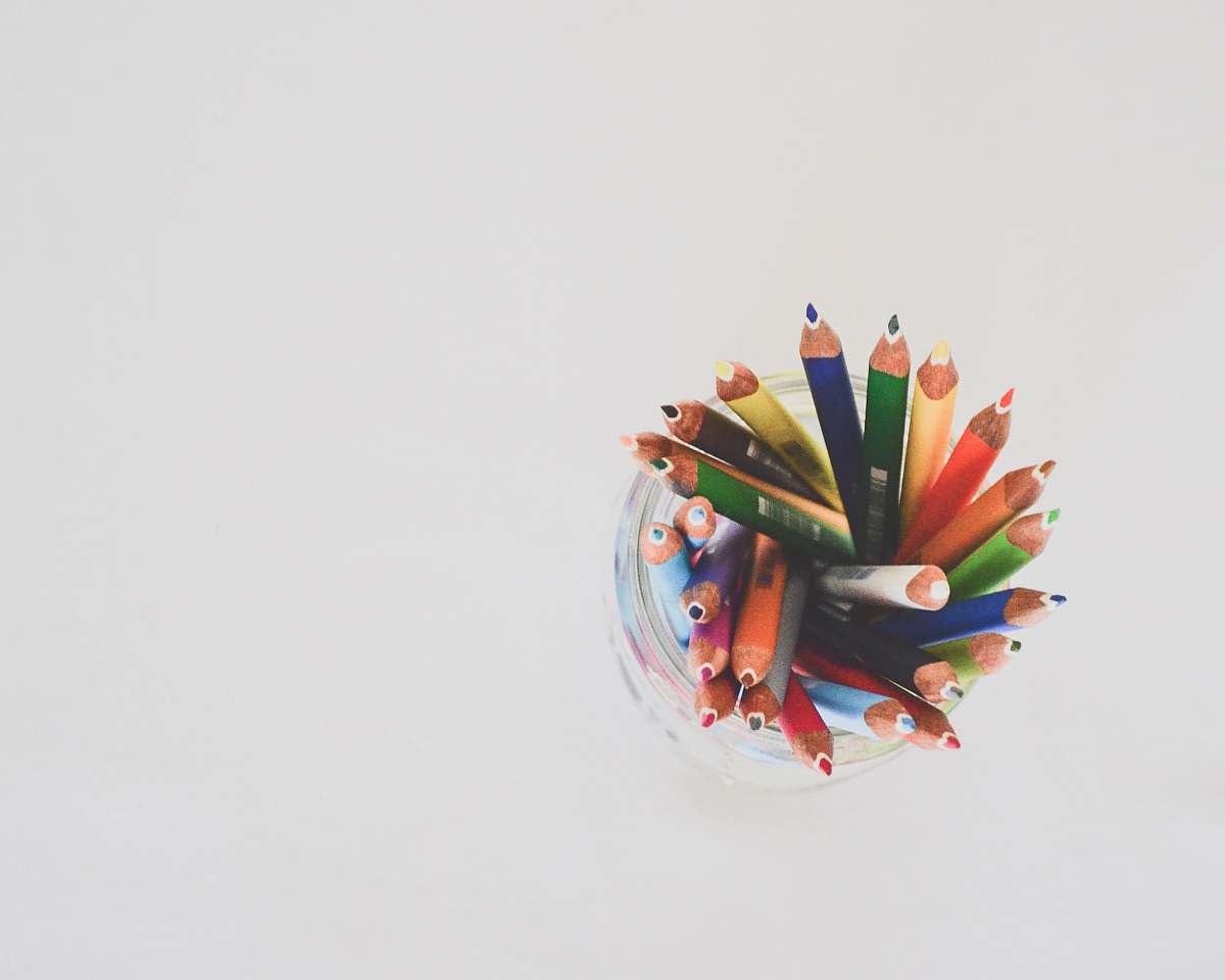 colorful colored pencils in top view photography jar